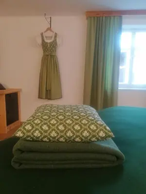 Ein Bett oder Betten in einem Zimmer der Unterkunft I da Mitt