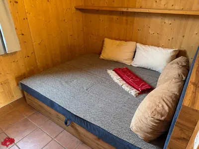 Ein Bett oder Betten in einem Zimmer der Unterkunft Ferienhaus Sternwarte