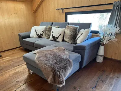 Ein Sitzbereich in der Unterkunft Bergchalet Stolzalpe