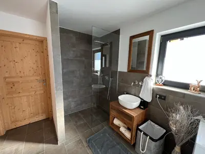 Ein Badezimmer in der Unterkunft Bergchalet Stolzalpe