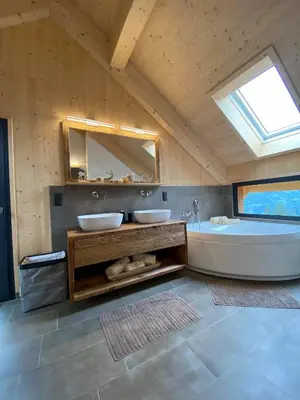 Ein Badezimmer in der Unterkunft Bergchalet Stolzalpe