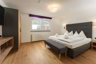 Ein Bett oder Betten in einem Zimmer der Unterkunft Villa Waluliso by Schladming-Appartements