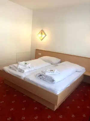 Ein Bett oder Betten in einem Zimmer der Unterkunft Apartment Heijerhof - Top 6