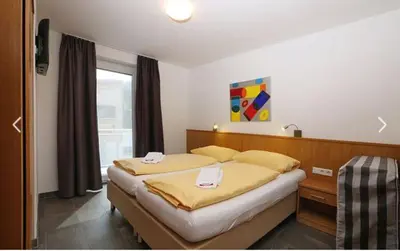 Ein Bett oder Betten in einem Zimmer der Unterkunft Deluxe Apartment SCHRABERGER TOP 6