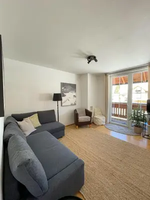 Ein Sitzbereich in der Unterkunft Penthouse Aineckblick