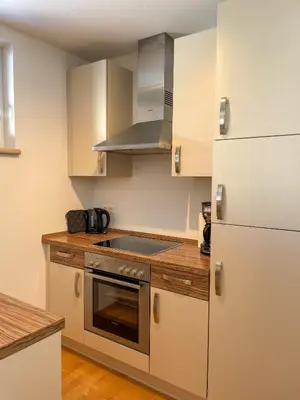 Küche/Küchenzeile in der Unterkunft Penthouse Aineckblick