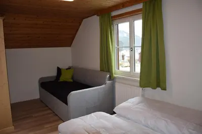 Ein Bett oder Betten in einem Zimmer der Unterkunft Alpenvereinshaus Pruggern