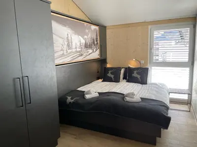 Ein Bett oder Betten in einem Zimmer der Unterkunft Villa Kreischberg