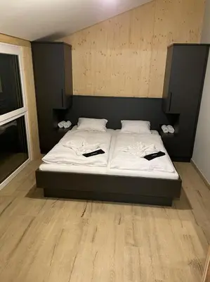 Ein Bett oder Betten in einem Zimmer der Unterkunft Villa Kreischberg