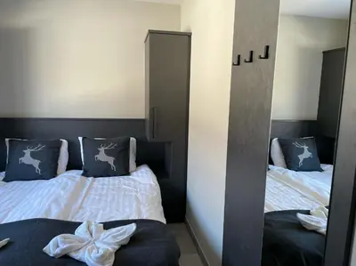 Ein Bett oder Betten in einem Zimmer der Unterkunft Villa Kreischberg