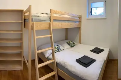 Ein Bett oder Betten in einem Zimmer der Unterkunft Apartman Hechlstein v Tauplitz