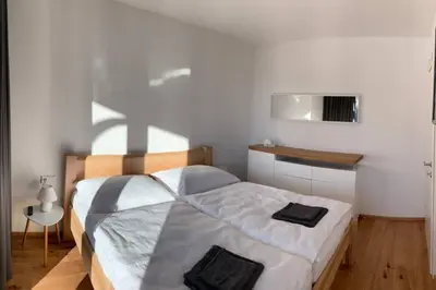 Ein Bett oder Betten in einem Zimmer der Unterkunft Apartman Hechlstein v Tauplitz