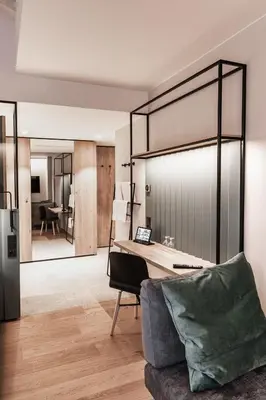 Ein Sitzbereich in der Unterkunft Stadthotel Goldenes Schiff