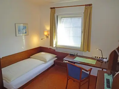 Ein Bett oder Betten in einem Zimmer der Unterkunft Hotel Schlair