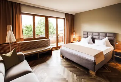 Ein Bett oder Betten in einem Zimmer der Unterkunft G'sund & Natur Hotel Die Wasnerin - Adults Only