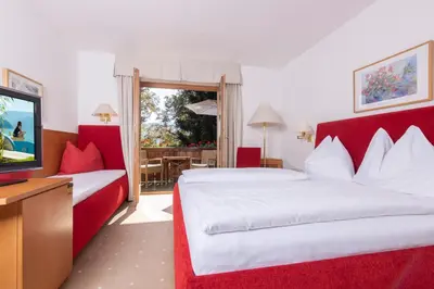 Ein Bett oder Betten in einem Zimmer der Unterkunft Hotel Furian
