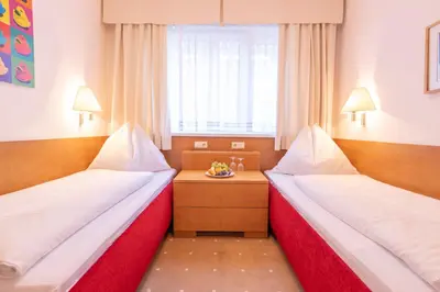 Ein Bett oder Betten in einem Zimmer der Unterkunft Hotel Furian