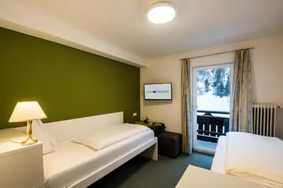 Ein Bett oder Betten in einem Zimmer der Unterkunft Hotel Obermayr