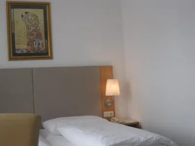 Ein Bett oder Betten in einem Zimmer der Unterkunft Attergauhof