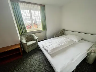 Ein Bett oder Betten in einem Zimmer der Unterkunft Attergauhof
