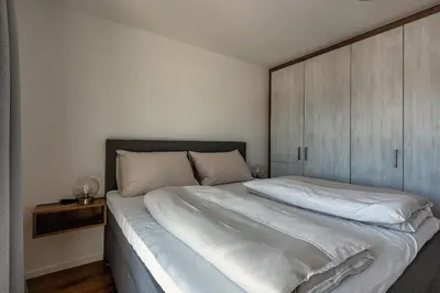 Ein Bett oder Betten in einem Zimmer der Unterkunft Ski & Nature Apartment