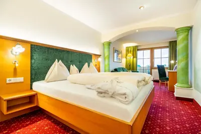 Ein Bett oder Betten in einem Zimmer der Unterkunft Hotel & Restaurant Wastlwirt