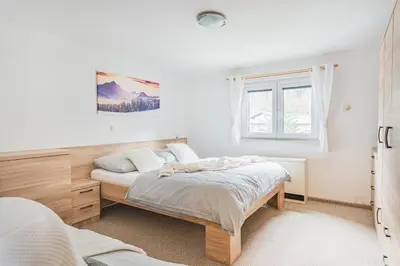 Ein Bett oder Betten in einem Zimmer der Unterkunft freeride-living