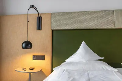 Ein Bett oder Betten in einem Zimmer der Unterkunft Hotel Jakob