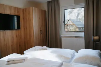 Ein Bett oder Betten in einem Zimmer der Unterkunft Obertrauner Hof