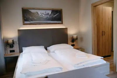 Ein Bett oder Betten in einem Zimmer der Unterkunft Obertrauner Hof