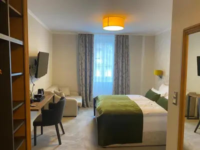 Ein Bett oder Betten in einem Zimmer der Unterkunft Hotel Radetzky
