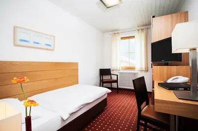 Ein Bett oder Betten in einem Zimmer der Unterkunft Hotel.Pension.Golingen