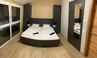Ein Bett oder Betten in einem Zimmer der Unterkunft Familienhaus Kreischberg
