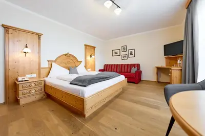 Ein Bett oder Betten in einem Zimmer der Unterkunft Hotel Gamsleiten
