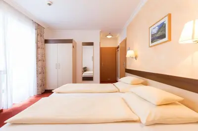 Ein Bett oder Betten in einem Zimmer der Unterkunft Hotel-Restaurant Planaihof