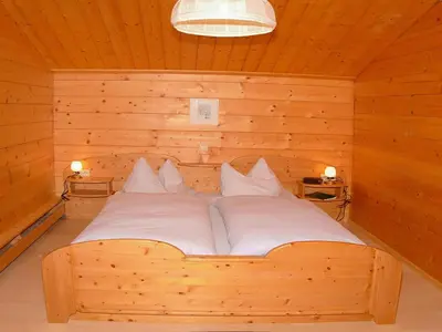 Ein Bett oder Betten in einem Zimmer der Unterkunft Cozy holiday apartment close to the slopes