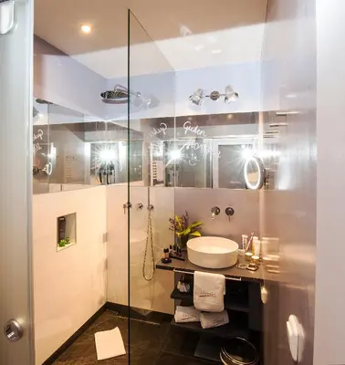 Ein Badezimmer in der Unterkunft Hotel LÄRCHENHOF