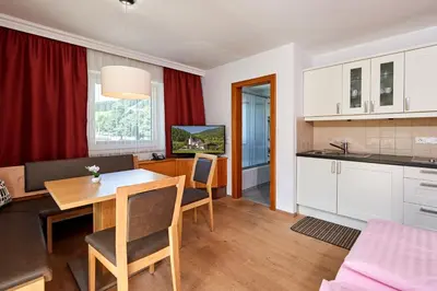 Küche/Küchenzeile in der Unterkunft Apartments Neue Post