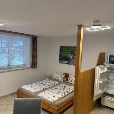 Ein Bett oder Betten in einem Zimmer der Unterkunft Ferienhof Osl
