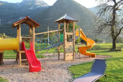 Ein Kinderspielbereich in der Unterkunft Ferienhof Osl