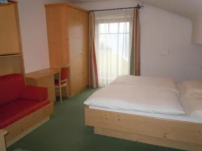 Ein Bett oder Betten in einem Zimmer der Unterkunft Haus Heigl