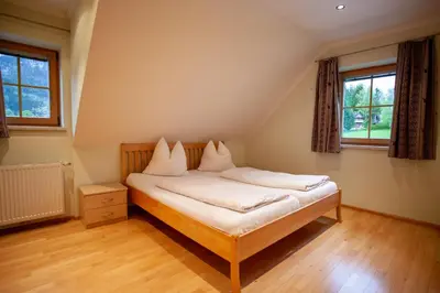Ein Bett oder Betten in einem Zimmer der Unterkunft Mühlrad Appartements