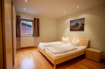Ein Bett oder Betten in einem Zimmer der Unterkunft Mühlrad Appartements