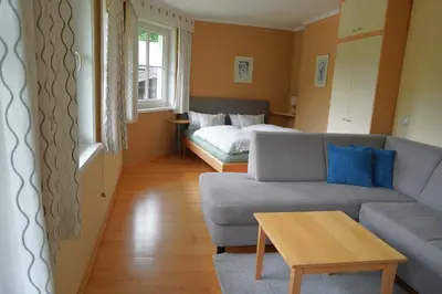 Ein Sitzbereich in der Unterkunft Appartement Genigau