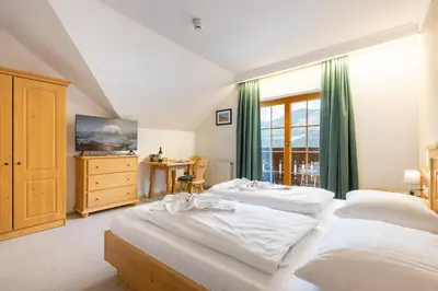 Ein Bett oder Betten in einem Zimmer der Unterkunft Apparthaus Sonnenberg