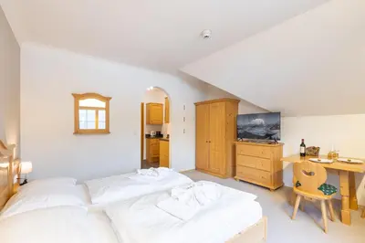 Ein Bett oder Betten in einem Zimmer der Unterkunft Apparthaus Sonnenberg