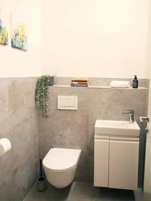 Ein Badezimmer in der Unterkunft SEE & THE CITY apartments