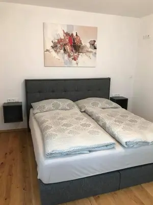 Ein Bett oder Betten in einem Zimmer der Unterkunft Appartement Attergau