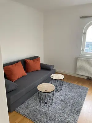 Ein Sitzbereich in der Unterkunft Appartement Attergau