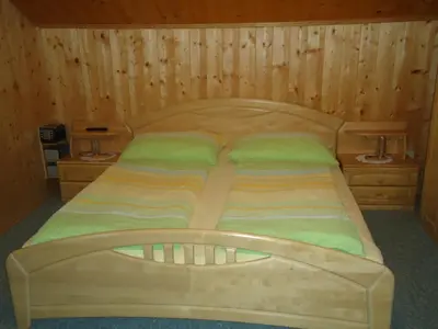 Ein Bett oder Betten in einem Zimmer der Unterkunft Pension Wald